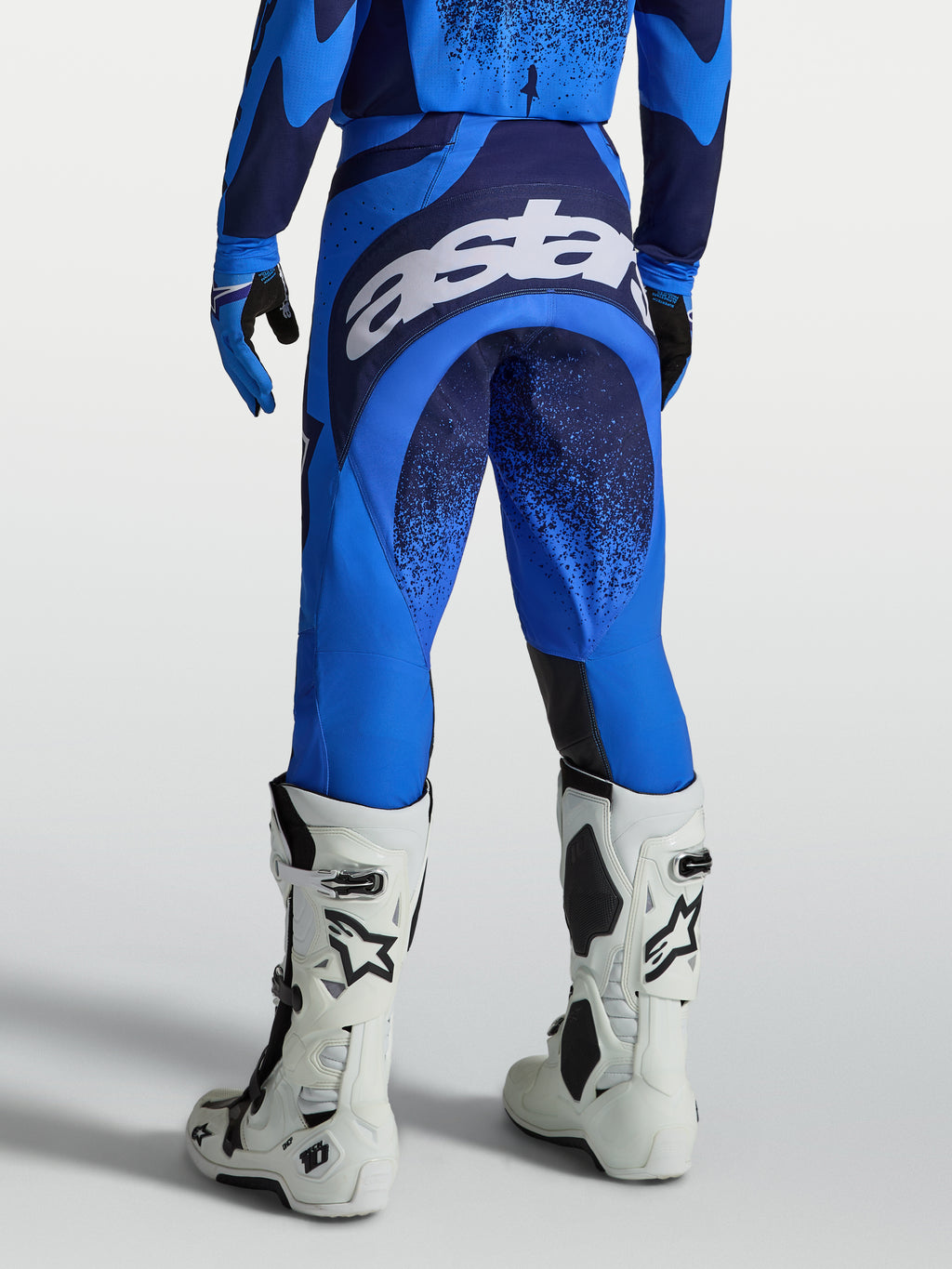 Alpinestars Techstar Swan Pants, Motocross Racing Pants for Men, Ucla Blue and Deep Blue, with large white seat logo.