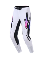 Alpinestars 2026 Supertech AFD Vista byxor, motocrossbyxor, vita med svarta och rosa-lila tonade detaljer, med framträdande stjärnlogotyper på låren, laserskurna perforeringar och atletisk passform för professionell terrängkörning