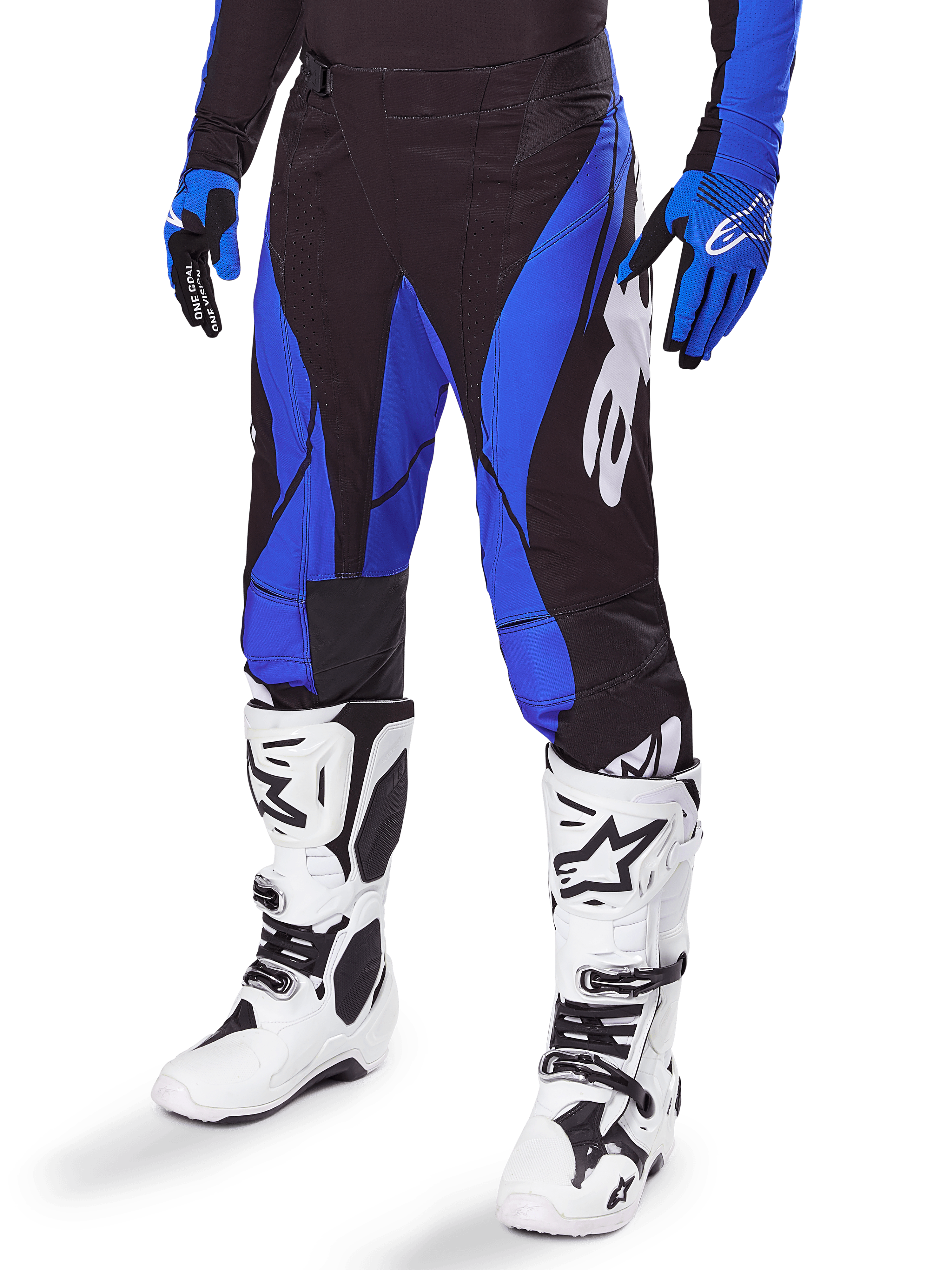 Alpinestars Techstar Dreem-byxor 2025, motocrossbyxor, svarta och blå, bärs med vita motocross-stövlar och blå handskar, med vit Alpinestars-logotyp på benet, slitstark konstruktion för terrängkörning