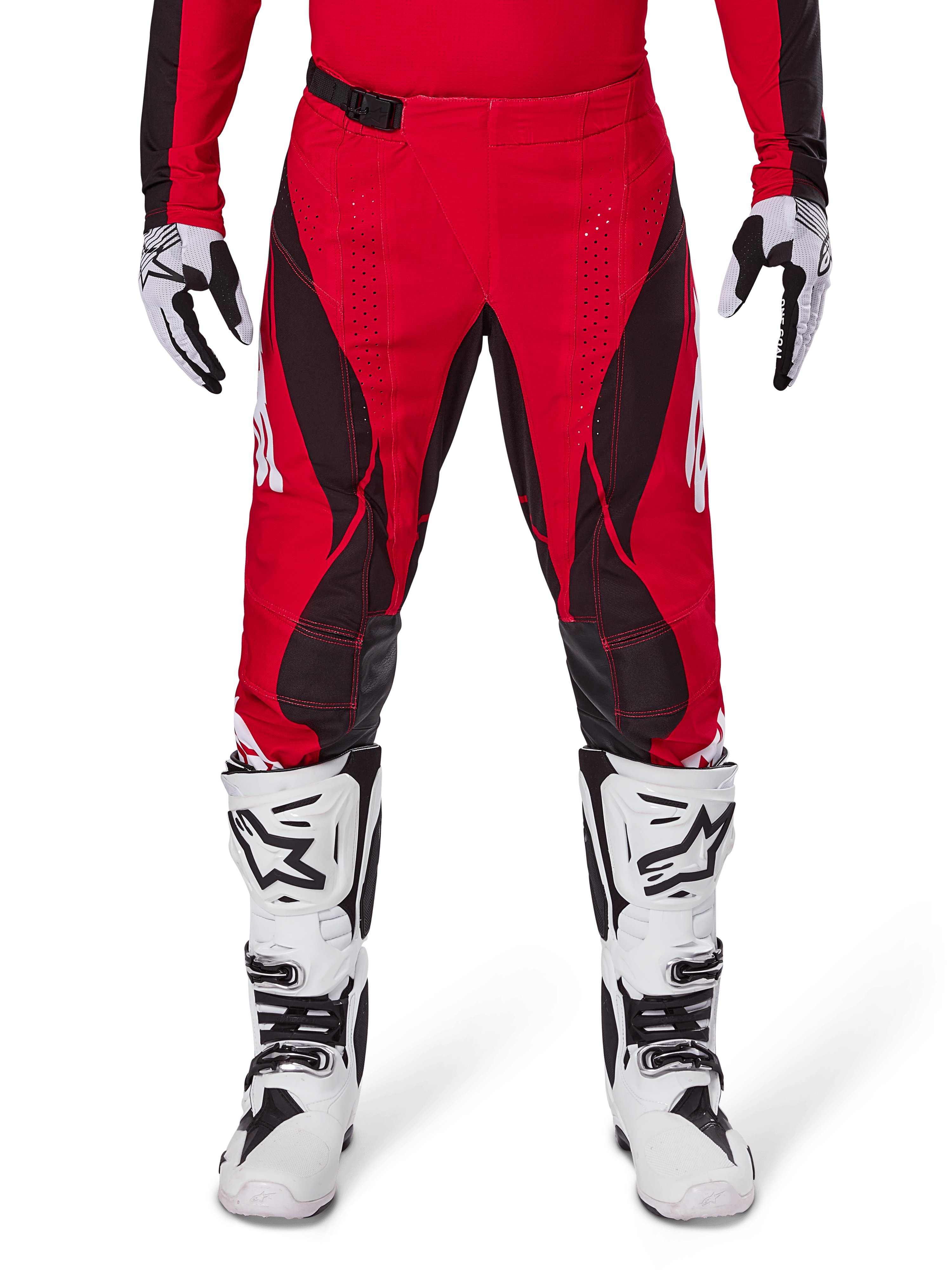 Alpinestars 2025 Techstar Dreem Pants, Motocross Pants, Bright Red and Black, featuring angular patterns and laser-cut ventilation holes, worn with white motocross boots and matching gloves for off-road racing