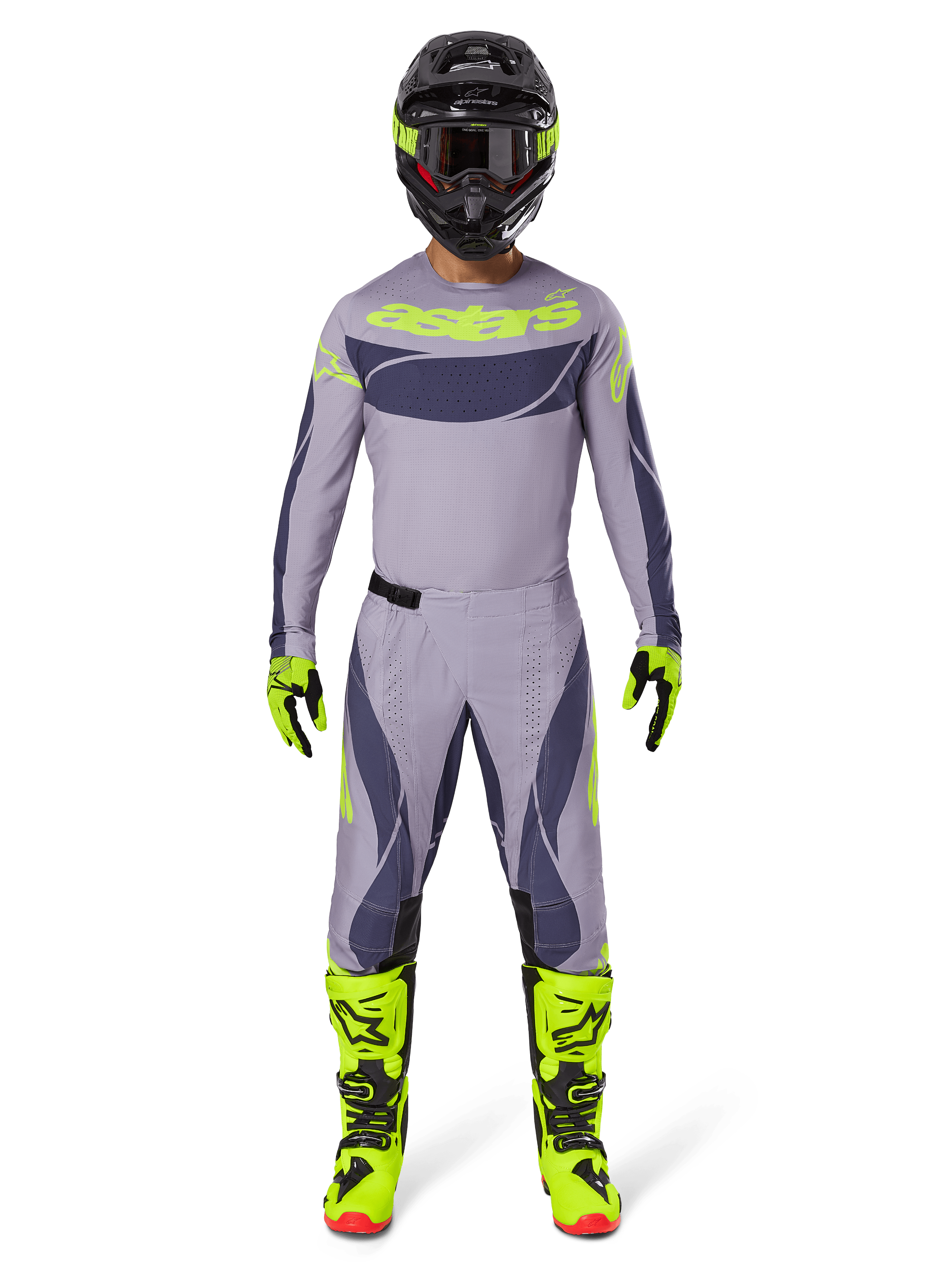 Motocross rider wearing complete racing gear, Alpinestars 2025 Techstar Dreem Pants in Gray and Dark Gray, matching jersey with fluorescent yellow branding, black helmet, fluorescent yellow boots and gloves, coordinated performance outfit for off-road racing