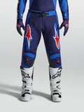 Alpinestars Racer Hunt byxor, blå och röda motocrossbyxor för herr, hållbar förböjd konstruktion med djärv stjärngrafik.