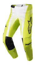Alpinestars 2023 Techstar Push Pants, Motocross Racing Pants, Yellow Fluo and White with Black accents, featuring black leather inner knee reinforcements, perforated ventilation panels, large black logo on the thigh, and adjustable waist buckle, high-performance off-road gear
