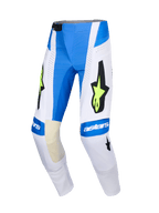 Alpinestars 2026 Techstar Knif-byxor, motocrossbyxor, Ucla-blå, vita och neongula, med en stor svart stjärnlogotyp med neongula detaljer, astars-logotyp på knäna, perforerade paneler för ventilation, sportig design för terrängkörning