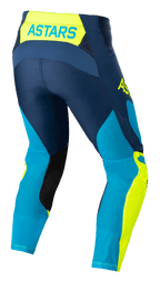 Alpinestars Techstar Factory-byxor, motocrossbyxor, mörkblå, neongula och klarblå neo, vy bakifrån med 'ASTARS'-logotyp på linningen, perforerade mesh-paneler för ventilation, svarta förstärkningar på benens insida och förböjd race-passform för terrängkörning