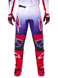 Alpinestars 2025 Fluid Wurx Pants, Motocross Pants, Purple and Bright Red, worn with matching red boots and gloves, featuring white logos on the thighs and black knee reinforcements, performance gear for off-road riding
