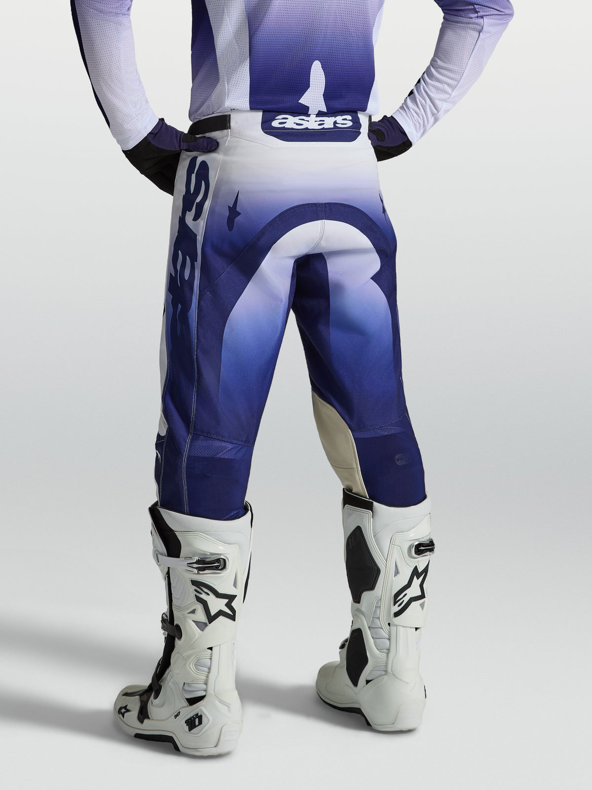 Alpinestars Racer Air Amber Motocross Pants, blue and white ventilated polyfabric with an ergonomic race-ready fit.