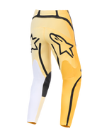 Alpinestars 2026 Fluid Apex byxor, motocrossbyxor, gula och svarta med vita detaljer, baksida med framträdande svart Astars-logotyp, asymmetrisk design med slitstarka förstärkta paneler och förböjd passform