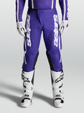 Alpinestars 2027 Fluid Apex V2 byxor, djupblå och vita herr-motocrossbyxor, förböjd design optimerad för terrängkörning.