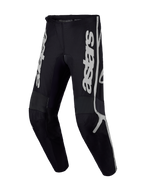 Alpinestars Fluid Apex V2 byxor, herrmotocrossbyxor, svarta och silver, hållbart polytyg, förböjd ergonomisk design.