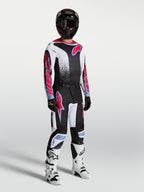 Alpinestars Fluid Drag byxor och tröja, motocrossställ för herr, svart och vit med röda fluo-detaljer, ergonomisk design för MX.