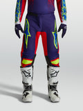 Alpinestars Fluid Drag byxor, mörkblå och röda motocrossbyxor med gula detaljer, ergonomisk passform för terrängkörning