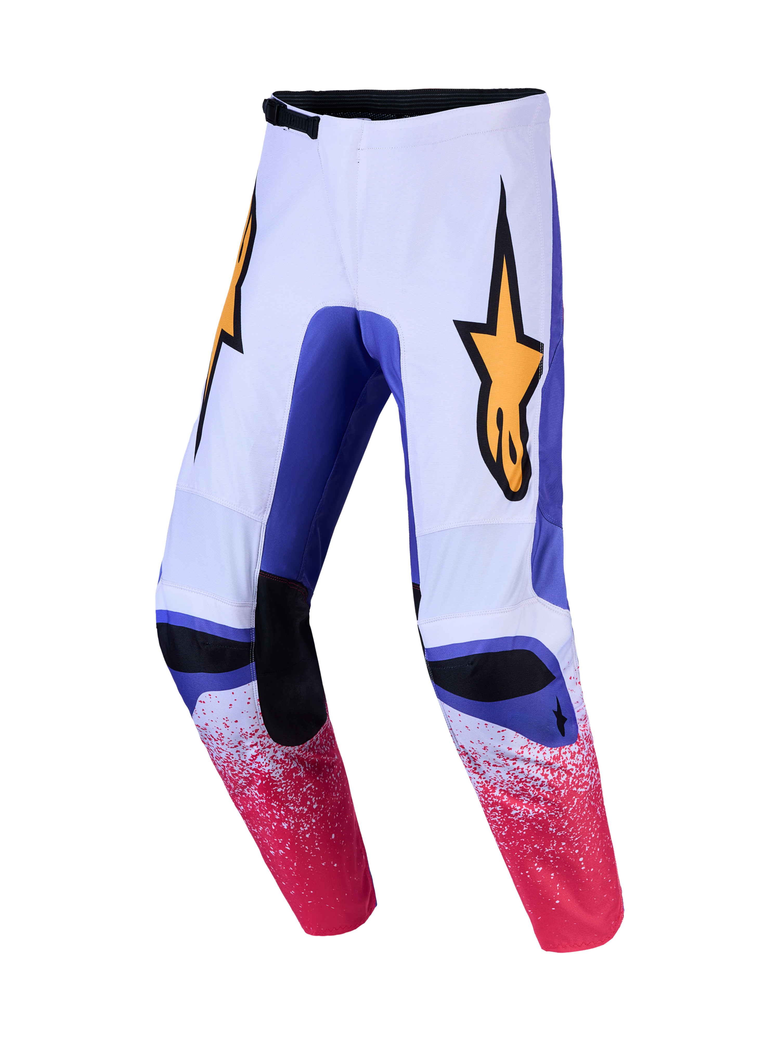 Alpinestars Fluid Drag byxor, vita och blåa motocrossbyxor med rosa spräcklig grafik och gul stjärnlogotyp, för terrängkörning.