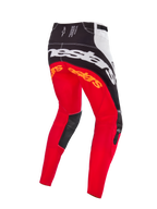 Alpinestars Limited Edition Techstar Deep Motocross Pants, Black White High Red colorway, rear view showing large white Alpinestars branding across the seat, orange logos on the upper legs, and black leather inner knee panels, designed for professional off-road racing.