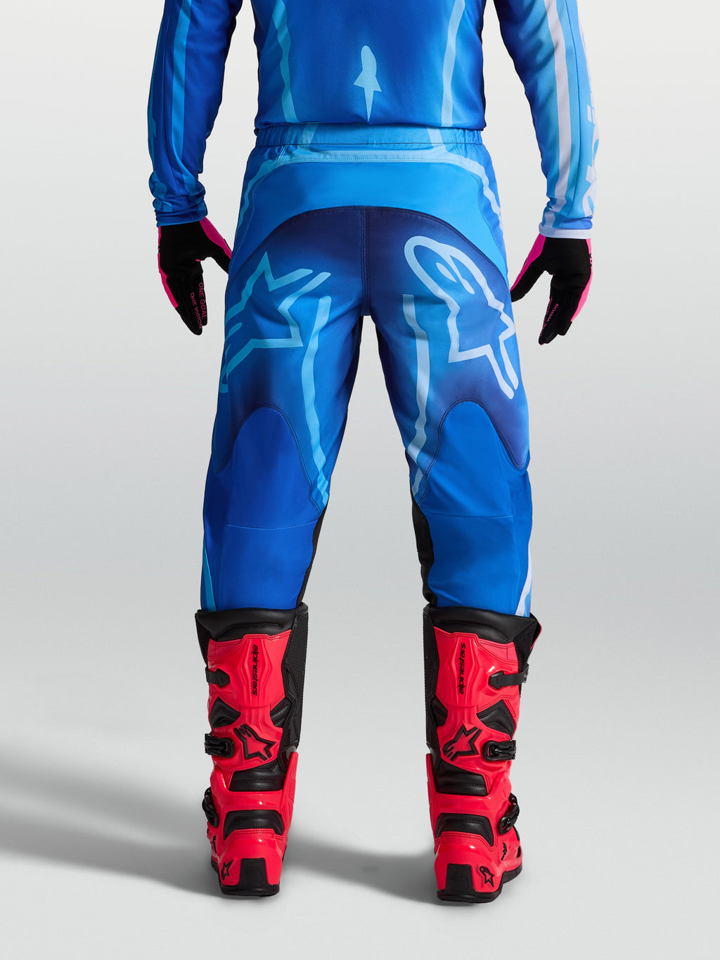 Alpinestars Fluid Kepler byxor, blå motocrossbyxor för herrar i 600D polytyg, baksida sedd på modell