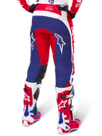 Alpinestars Limited Edition Techstar Fortitude Pants, Motocross Pants, Red White and Blue, back view worn with matching red and white boots, featuring white star logos on the thighs, durable multi-panel design for professional off-road racing.