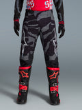 Alpinestars Limited Edition Techstar Beast Coast Pants, pirate black and orange motocross gear with a camo pattern.