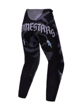 Begränsad Upplaga Techstar Beast Coast Byxor, svart och grå camo med gotisk Alpinestars-logotyp på baksidan.