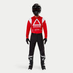 Alpinestars Techdura Pants, Enduro and Off-Road Pants, Black, worn with a red and white Astars long-sleeve jersey, black helmet, and black and white boots, featuring a rugged stretch polyamide construction and technical paneling for off-road riding.