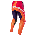 Alpinestars 2024 Techstar Pneuma byxor, motocrossbyxor, lila, orange och djupt blå, stor vit logotyp på baksidan, hållbart material med stretchzoner för maximal rörlighet vid terrängkörning.