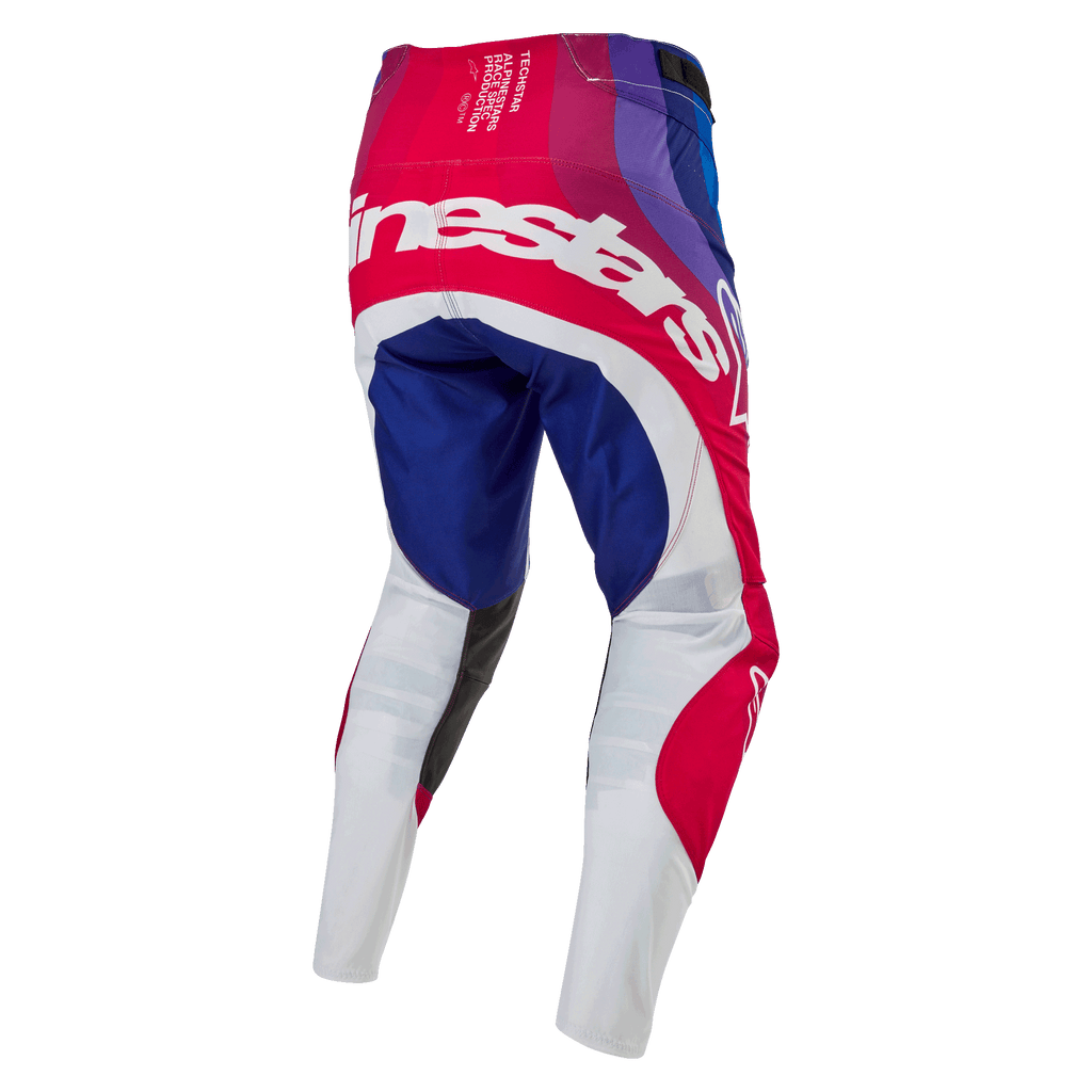 Alpinestars 2024 Techstar Pneuma byxor, motocrossbyxor, blå, röda och vita, vy bakifrån med stor vit Alpinestars-logotyp över sätet, blå och röda paneler med vita underben, hållbar design för terrängtävling