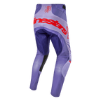 Alpinestars 2024 Techstar Ocuri byxor, lila motocrossbyxor sedda bakifrån med stor orange logotyp över sätet, ventilationspaneler och slitstarka material för terrängkörning
