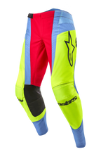 Alpinestars 2024 Techstar Ocuri byxor, motocrossbyxor, ljusblå, neongula och röda, med svarta innerpaneler vid knäna, framträdande Alpinestars-logotyp och livfulla flerfärgade paneler för terrängkörning