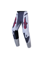 Alpinestars Ungdom Supertech Swan-byxor, motocrossbyxor, gråa och vita med röda stjärnlogotyper, atletisk stretch rip-stop.