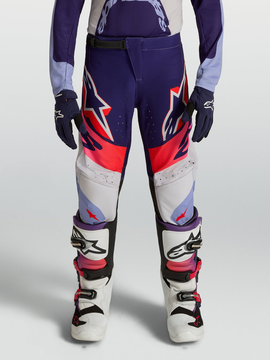 Alpinestars Supertech Dyna motocrossbyxor för ungdom, lila och rosa fluo, lätt stretchig ripstop-konstruktion.
