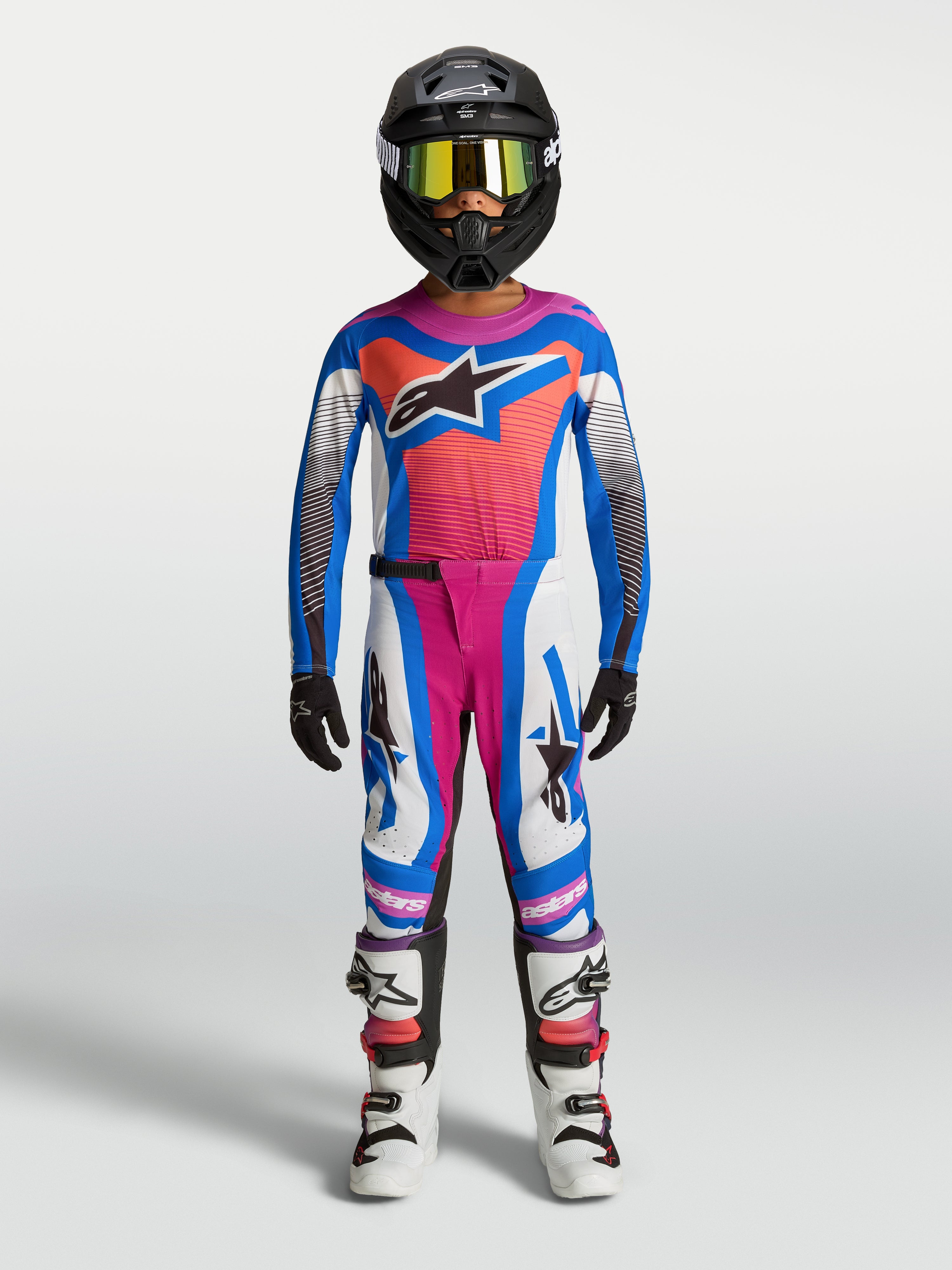 Alpinestars Youth Supertech Maven Pants, Motocross Gear in White, Hot Coral and Blithe Blue, for young competitive riders.