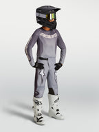 Alpinestars 2027 Fluid Amber ungdomsbyxor, motocrossbyxor i sand och vitt med stjärngrafik och sportig passform