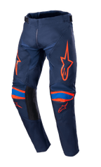 Alpinestars 2023 Youth Racer Narin byxor, motocrossbyxor, Night Navy och Hot Orange, med klarorange logotypgrafik på lår och knän, blå detaljer, svarta paneler på insidan av benen, slitstark textilkonstruktion för terrängkörning