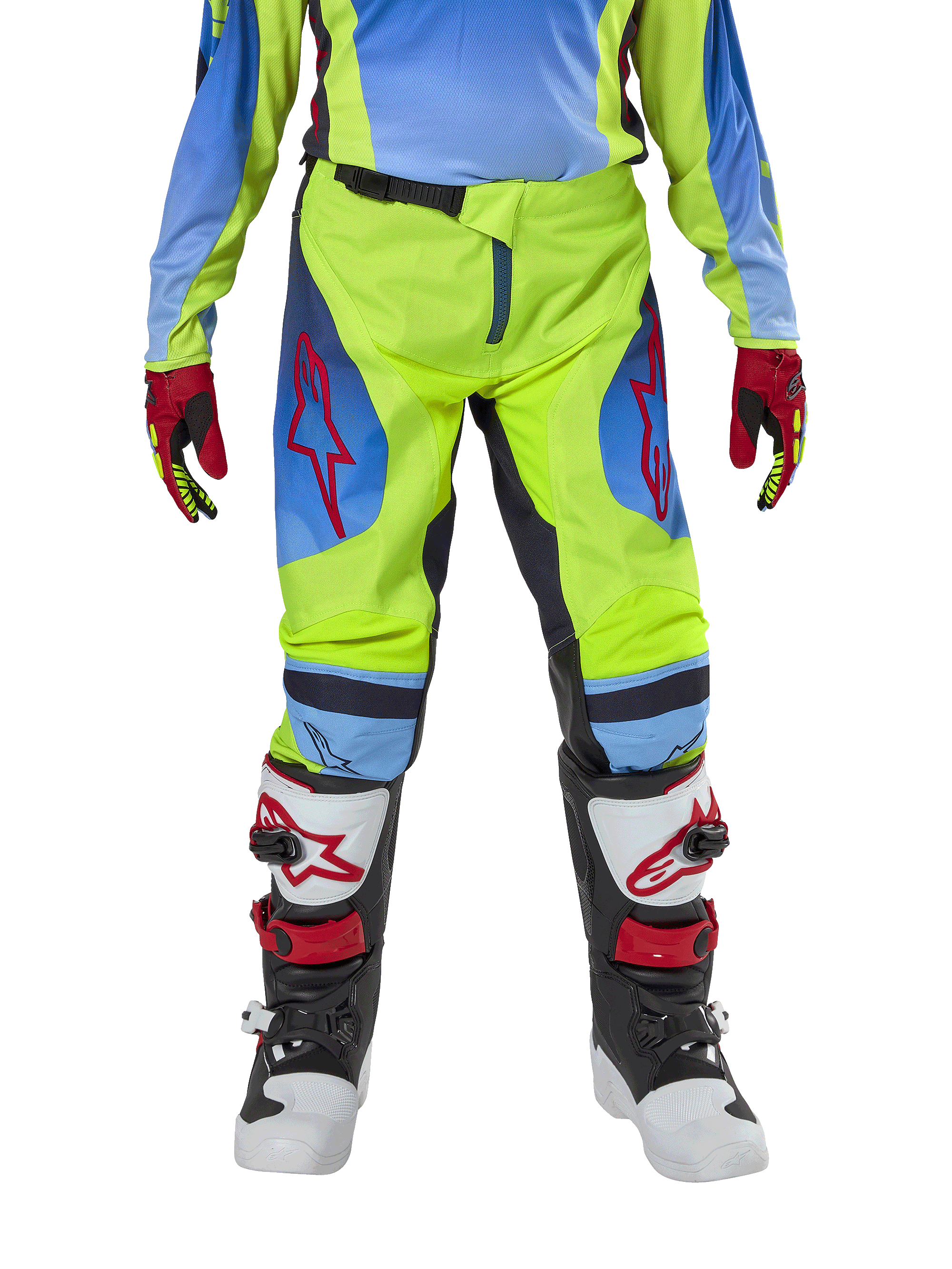 Alpinestars Youth 2024 Racer Hoen byxor, motocrossbyxor för ungdomar, neongul och mörkblå (Blue Night Navy), med röda stjärnlogotyper på låren, bärs med matchande tröja, röda och svarta handskar samt vita, svarta och röda motocross-stövlar, hållbar utrustning för terrängkörning