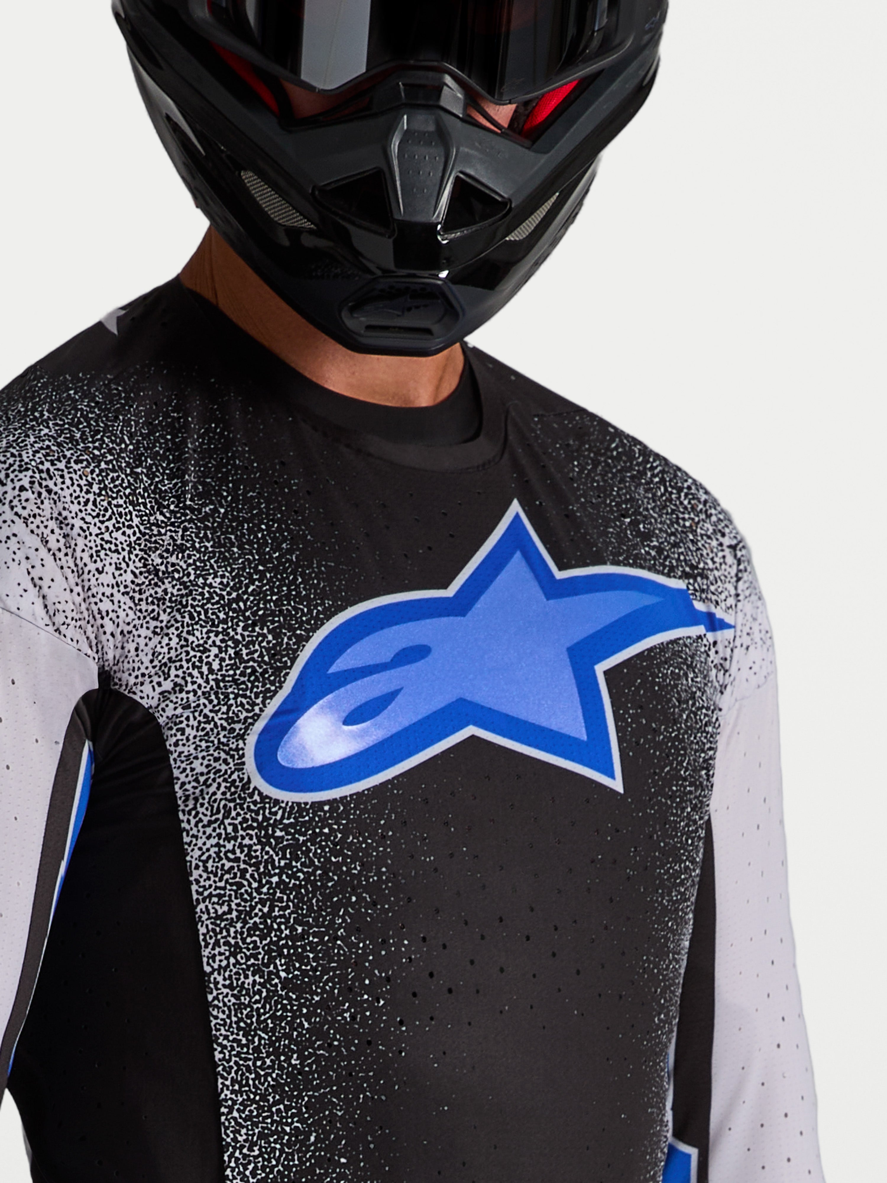 Alpinestars Supertech Hiten AFD tröja, svart och blå motocrosströja för herrar med laserskuren ventilation för racing.