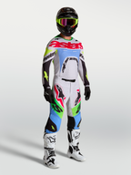 Alpinestars 2027 Supertech Dyna tröja och MX-ställ för herr, ljus lila och grön fluo, atletisk racingpassform på modell.
