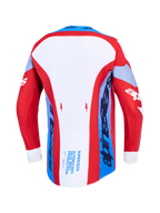 Alpinestars Supertech Dyna tröja, röd, vit och mörkblå motocrosströja, vy bakifrån med förlängd rygg.