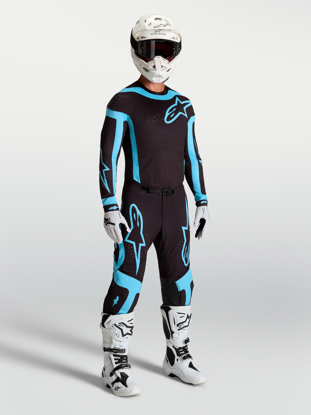 Alpinestars Supertech Vesta tröja och utrustningsset för herrar, svart och turkos motocrossoutfit, atletisk racingpassform.