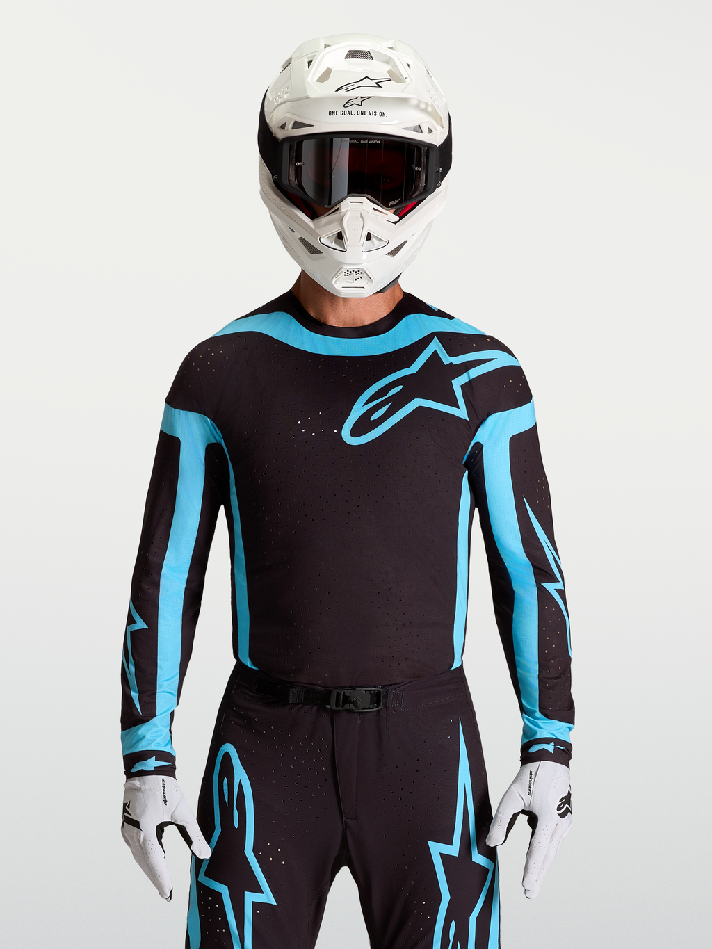 Alpinestars Supertech Vesta tröja, svart och turkos motocrosströja för herr med ventilerande laserskurna perforeringar.