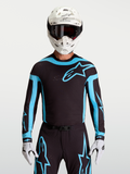 Alpinestars Supertech Vesta tröja, svart och turkos motocrosströja för herr med ventilerande laserskurna perforeringar.
