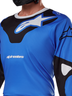 Alpinestars 2025 Racer Veil Jersey, Motocross Jersey, Blue and Black, featuring a technical graphic pattern, long sleeves, and Astars branding on the chest, designed for off-road performance.