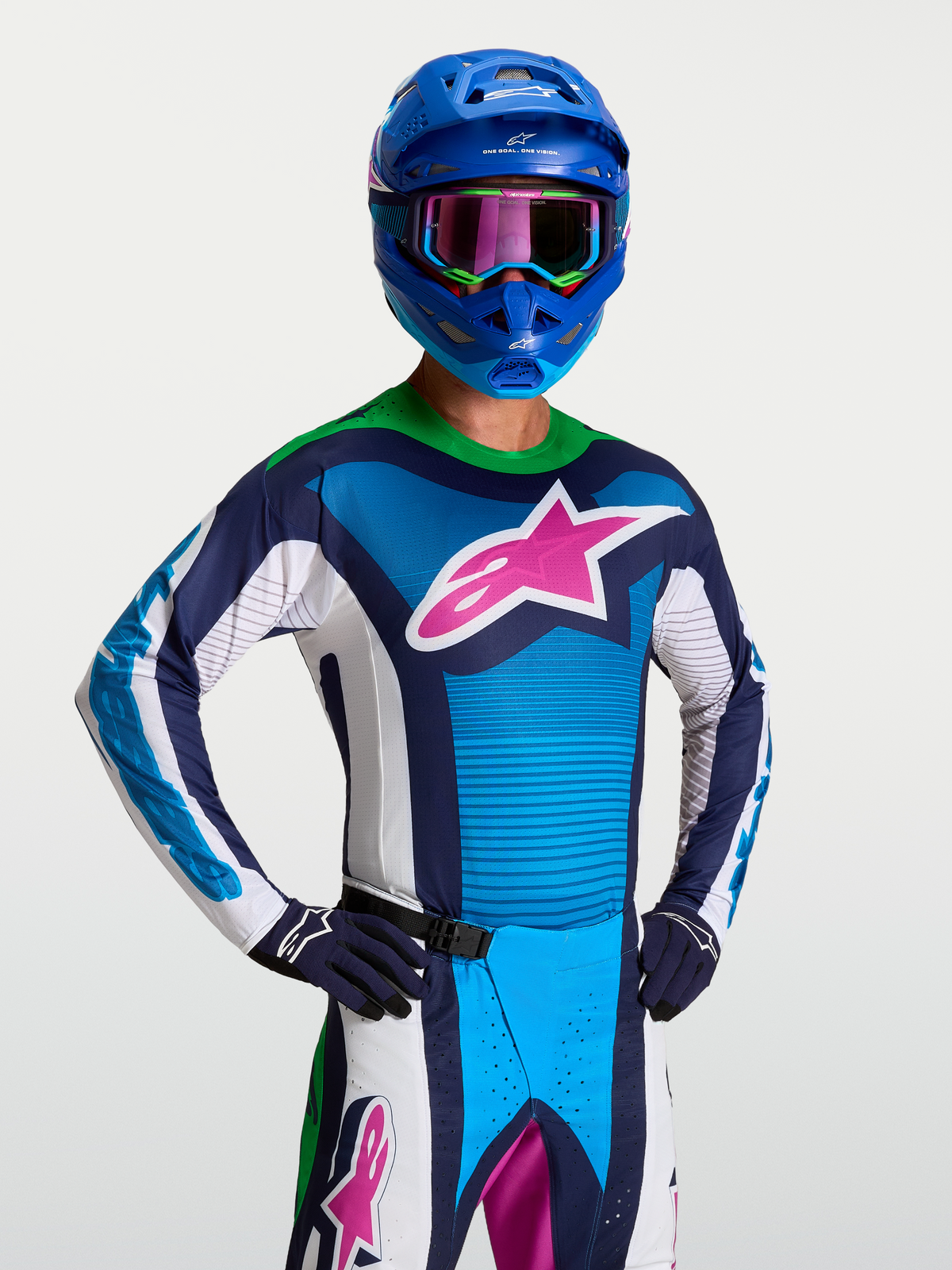 Alpinestars Techstar Maven tröja, blå och vit motocrosströja för herrar med rosa stjärnlogotyp och neongrön krage, racing.