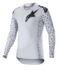 Alpinestars 2023 Supertech North Jersey, Motocross Jersey, Haze Gray and Black, white long-sleeve jersey with gray spotted pattern on sleeves and sides, black star logo on chest and shoulders, performance stretch mesh with curved hem