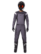 Alpinestars 2025 Fluid Haul Gear Set, Motocross gear, Gray, gray jersey and pants with black accents, black helmet with orange goggles, black boots with white logos, coordinated racing outfit for off-road performance