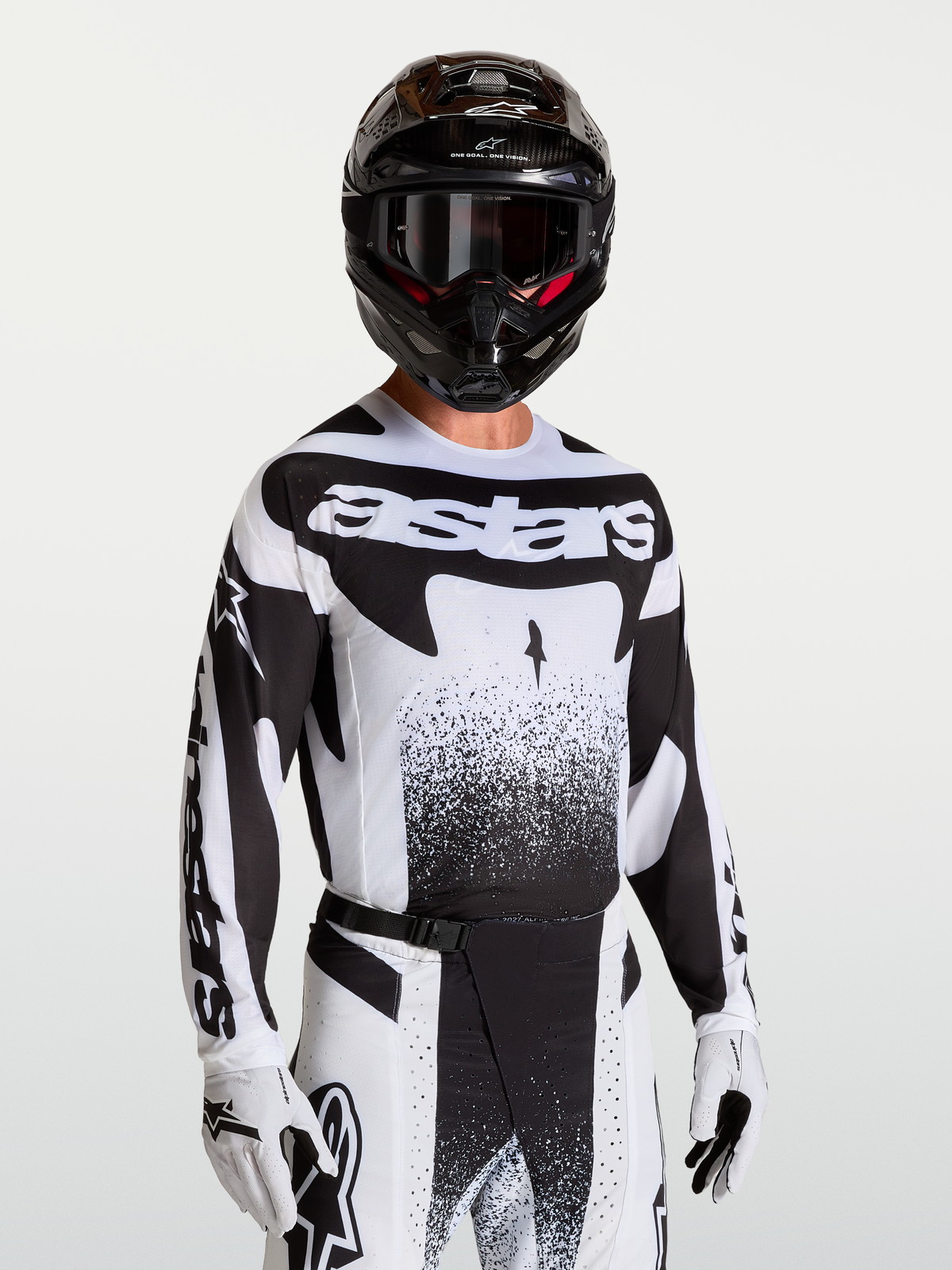 Alpinestars Techstar Swan tröja, svart och vit motocrosströja för herrar med atletisk passform och laserskuren ventilation.