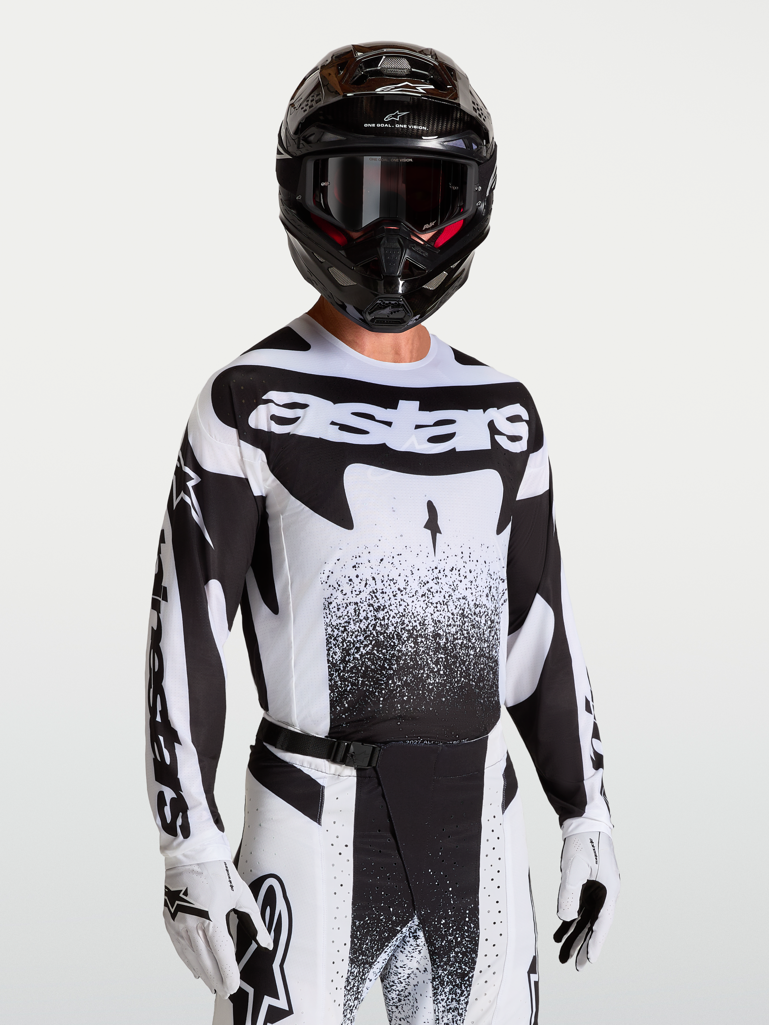 Alpinestars Techstar Swan tröja, svart och vit motocrosströja för herrar med atletisk passform och laserskuren ventilation.