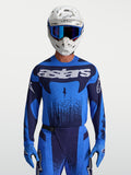 Alpinestars Techstar Swan tröja, blå och mörkblå motocrosströja med ergonomisk passform, laserperforerad ventilation och vit grafik.