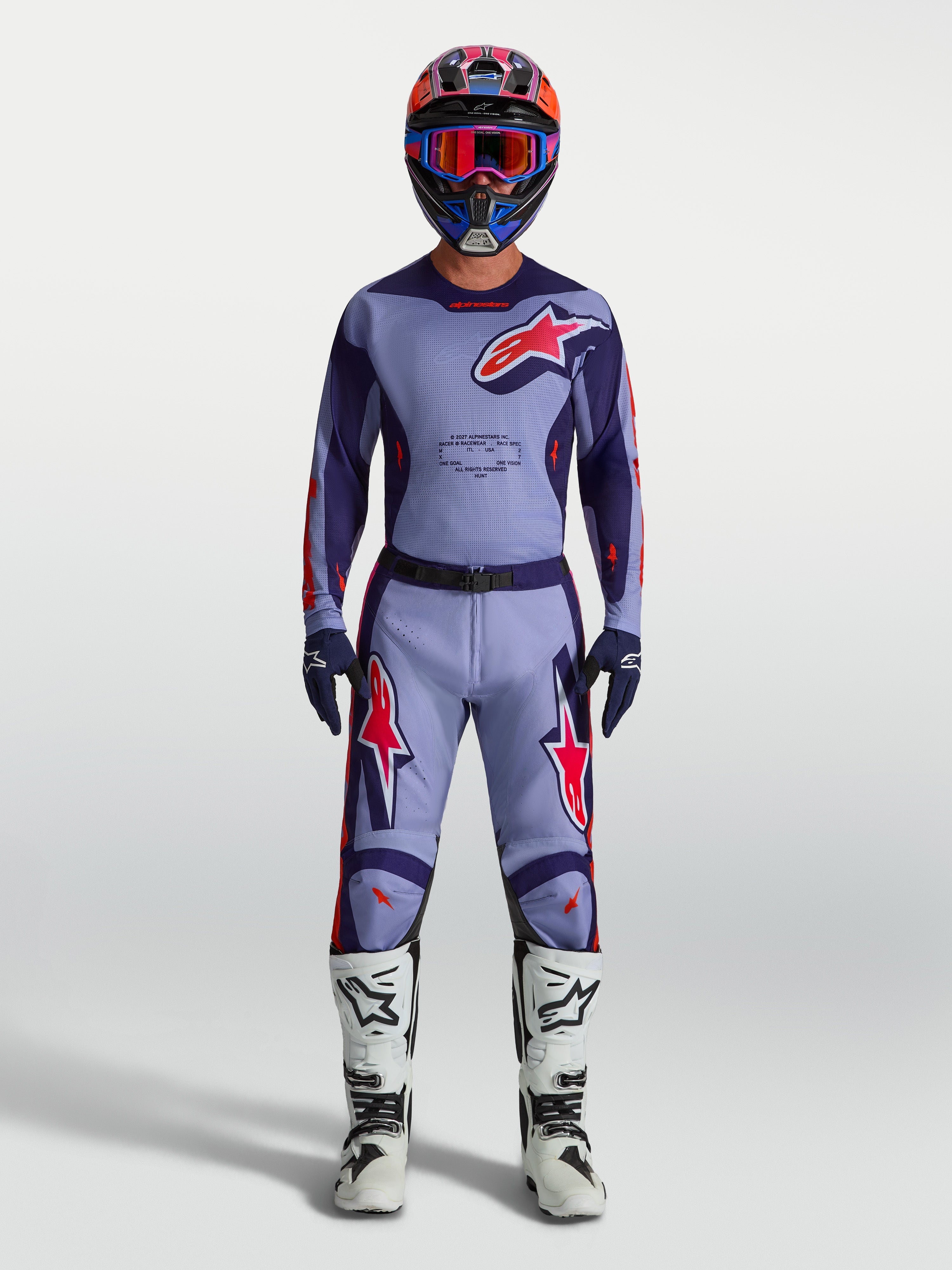 Alpinestars 2027 Racer Air Hunt Gear Set, Men's Purple and Red Motocross Kit with ventilated jersey and white boots.