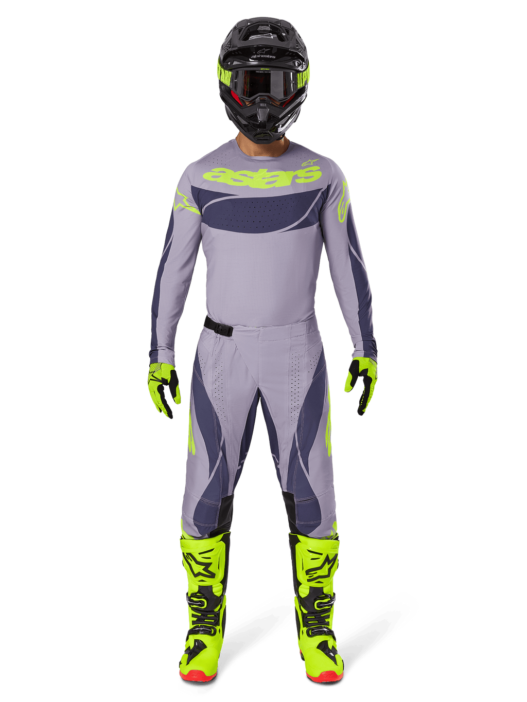 Motocrossförare i komplett racingutrustning, 2025 Techstar Dreem-tröja i grått och mörkgrått med neongula logotyper, matchande gråa och mörkgråa byxor, neongula och svarta stövlar, svart hjälm med neondetaljer, koordinerad outfit för professionell motocross