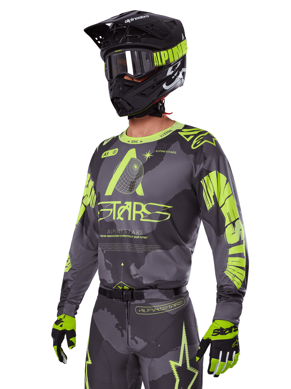 Alpinestars 2025 Racer Hollow-utrustningsset, motocrosströja och byxor i grått och neongult, bärs med matchande svart hjälm, goggles och handskar, med framträdande neongula Alpinestars-logotyper och stjärngrafik på en mönstrad grå bas, koordinerad professionell racinglook för terrängkörning