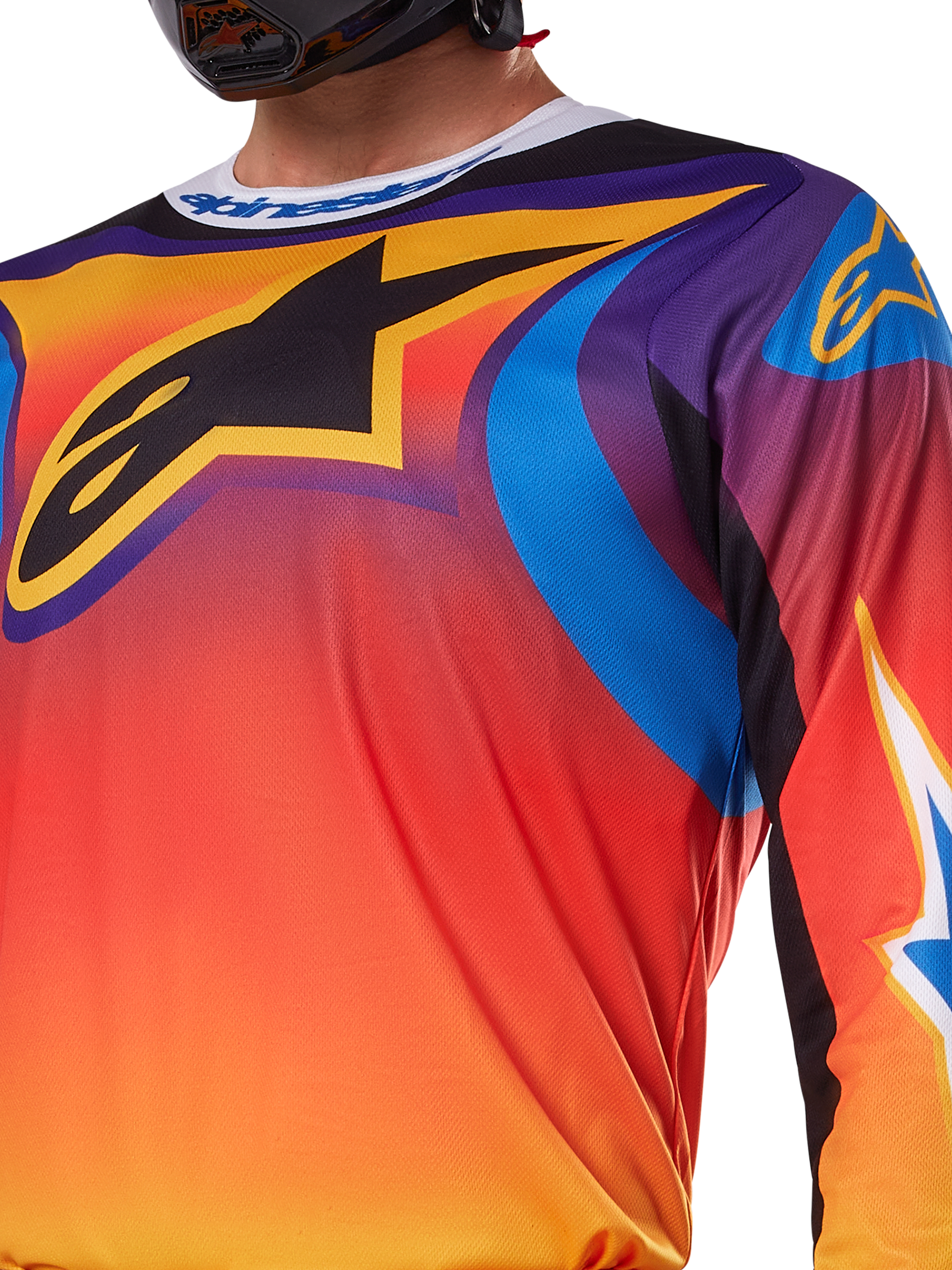 Alpinestars 2025 Fluid Wurx-tröja, mångfärgad design i vitt och orange, långärmad motocrosströja, avslappnad atletisk passform, fukttransporterande polytyg för terrängprestanda
